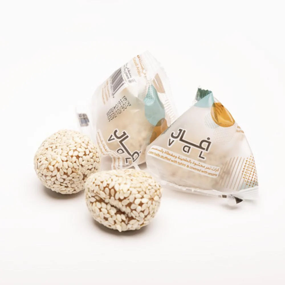 VaL Dates balls stuffed with tahini & covered with sesame